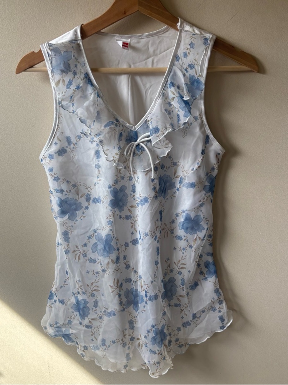 Satin Blue Floral Sleeveless Top with Ruffle and Bow Detail